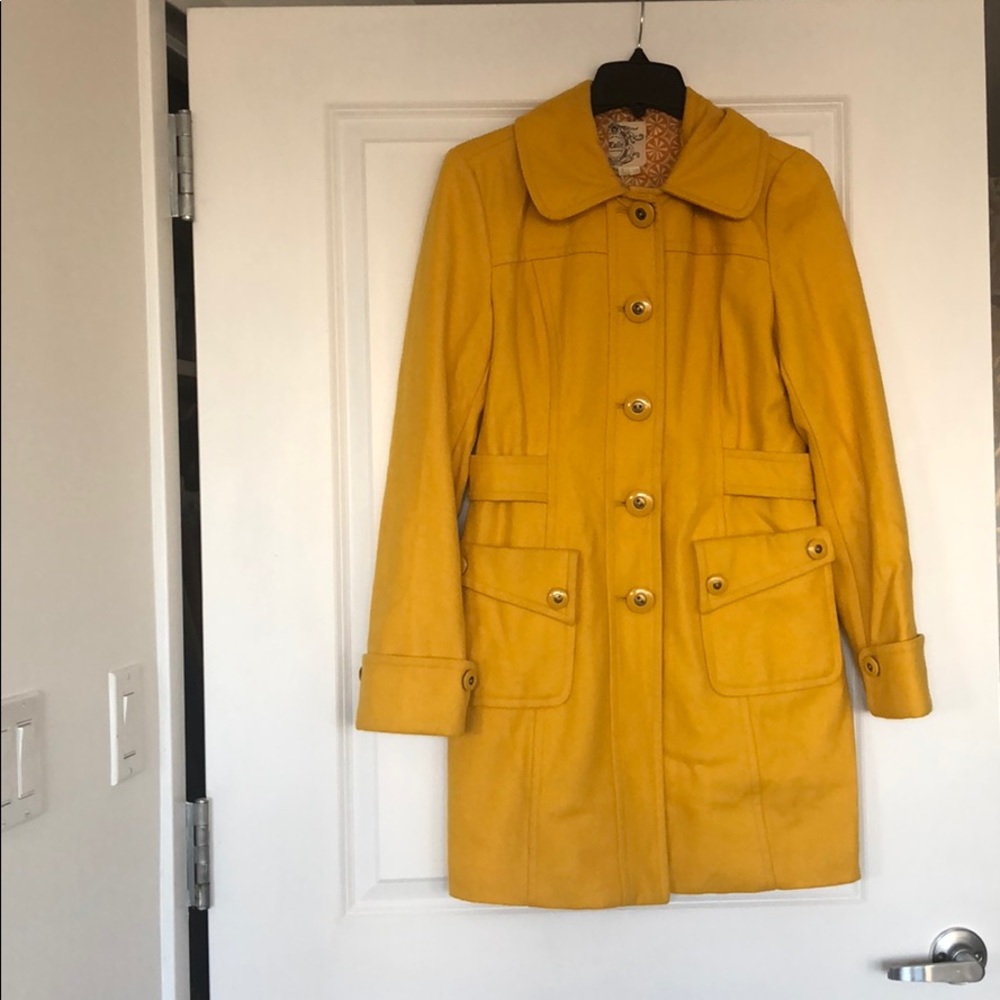 A gorgeous mustard yellow wool coat